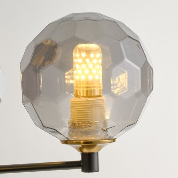 Aurorae glazen en metalen kroonluchter met warm wit licht