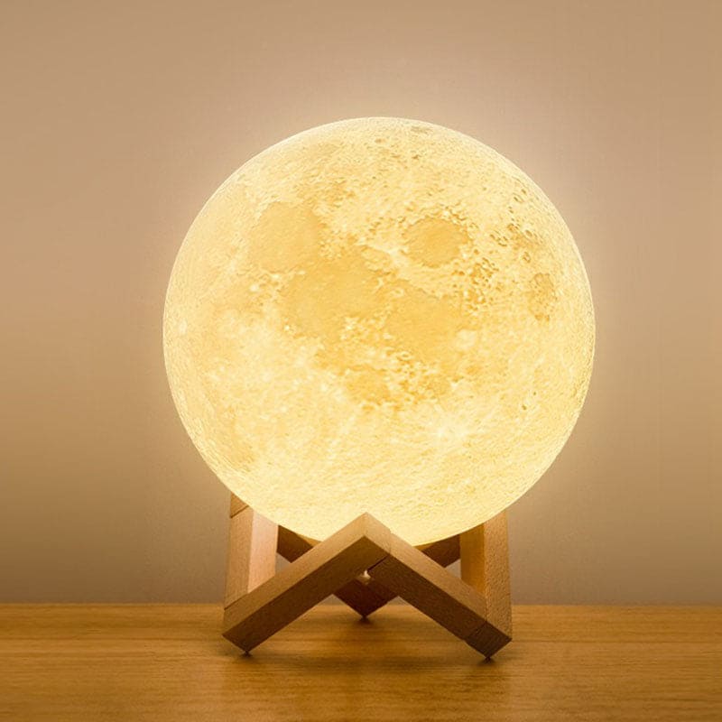 OrionLume LED stolní lampa ve tvaru srpku měsíce pro teplé světlo u postele