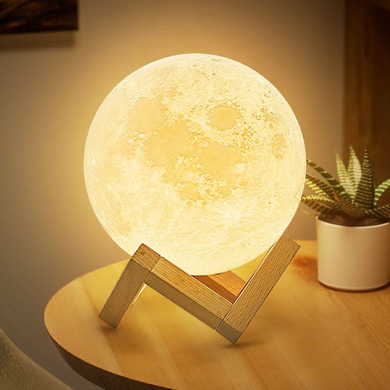 OrionLume LED stolní lampa ve tvaru srpku měsíce pro teplé světlo u postele
