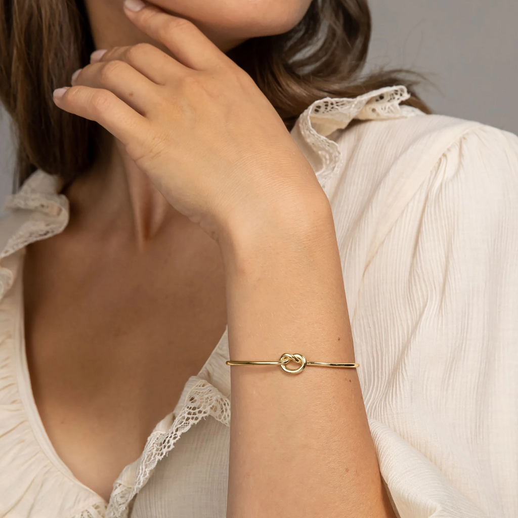 Adjustable Bangle With Love Knot Accent For Everyday Wear Plus Layering