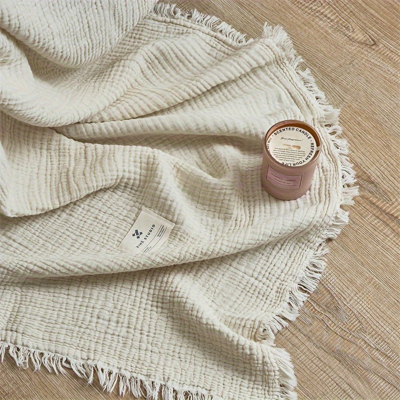 Přikrývka Olivebreeze z 4 vrstev bavlněné gázy s elegantními třásněmi pro každodenní pohodlí