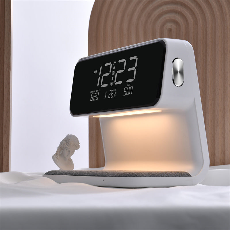 Sveglia compatta ed elegante per il comodino con luce LED e ricarica wireless