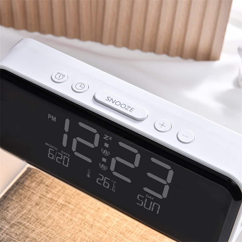Sveglia compatta ed elegante per il comodino con luce LED e ricarica wireless