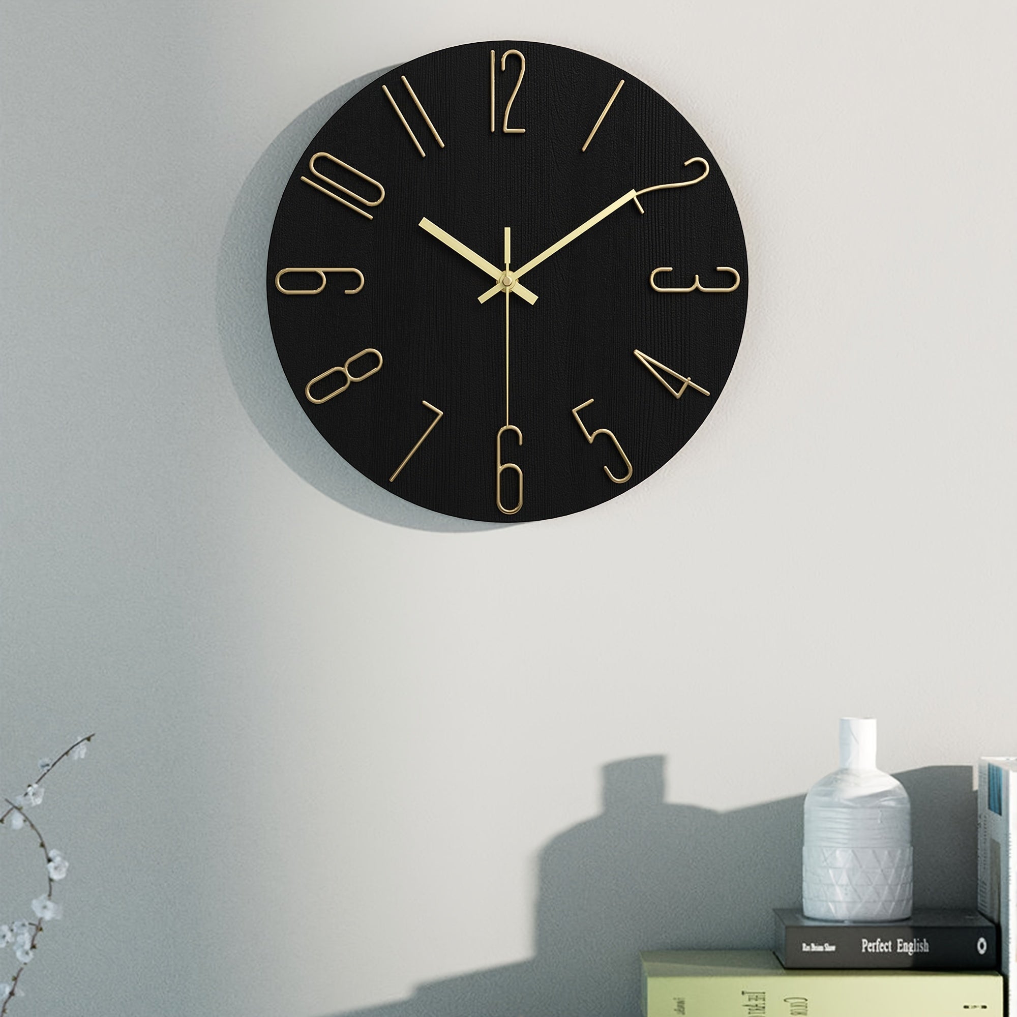 Luminair Runde Wanduhr, randloses minimalistisches Design in Schwarz und Gold