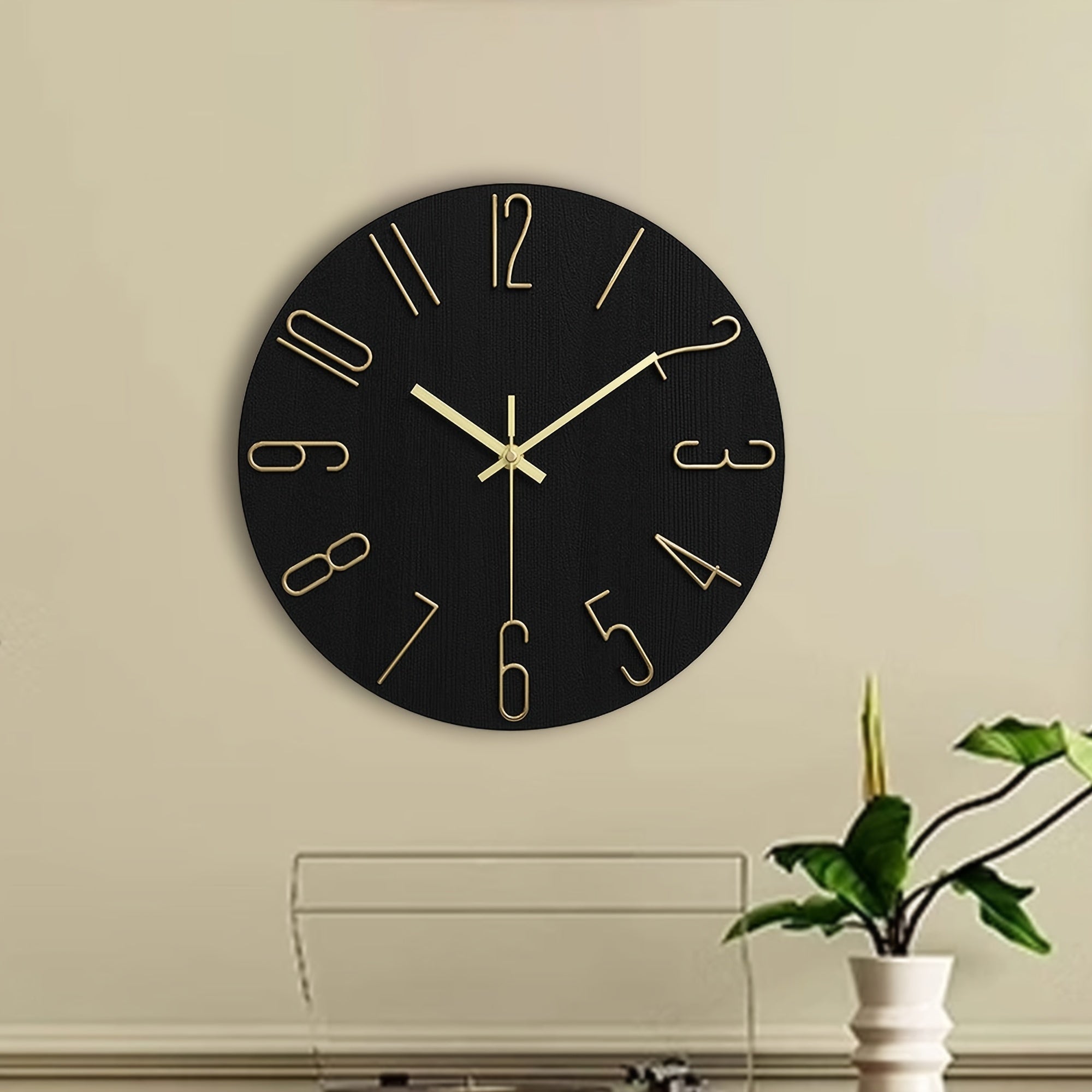 Luminair Runde Wanduhr, randloses minimalistisches Design in Schwarz und Gold