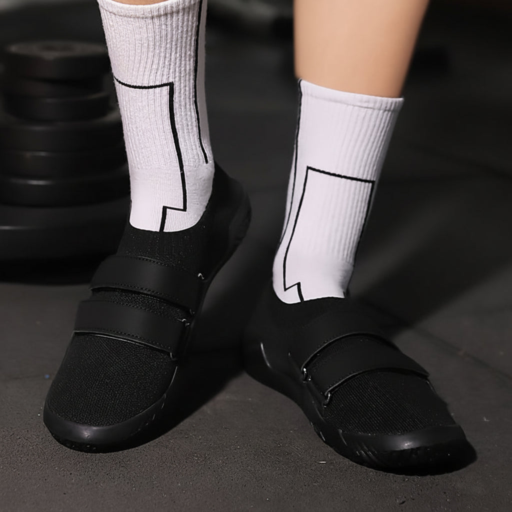 Buty Ironstance z płaską podeszwą do przysiadów i martwych ciągów, stabilność na siłowni
