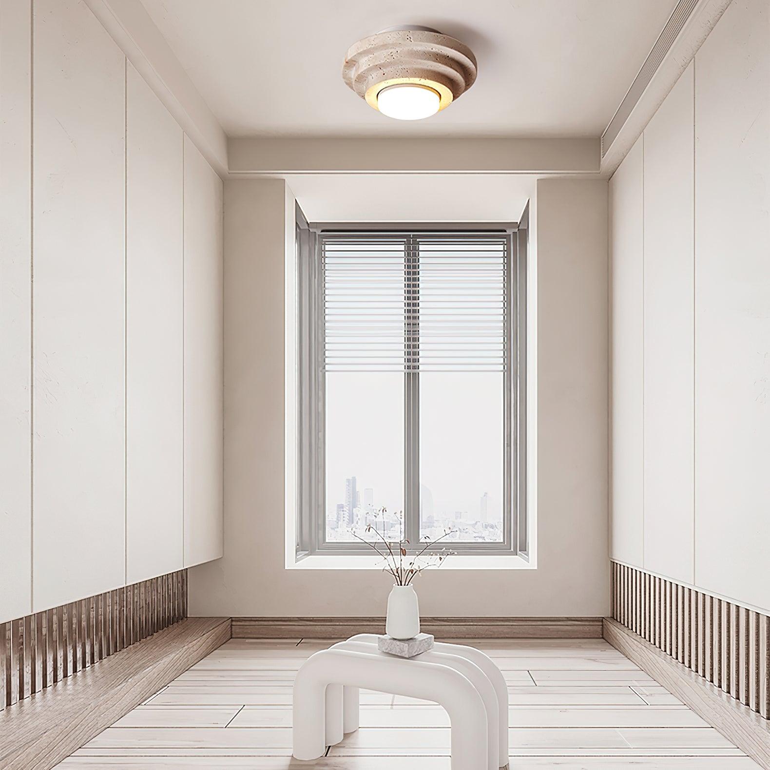 Lampada da soffitto LED TerraLuxe in travertino con luce calda