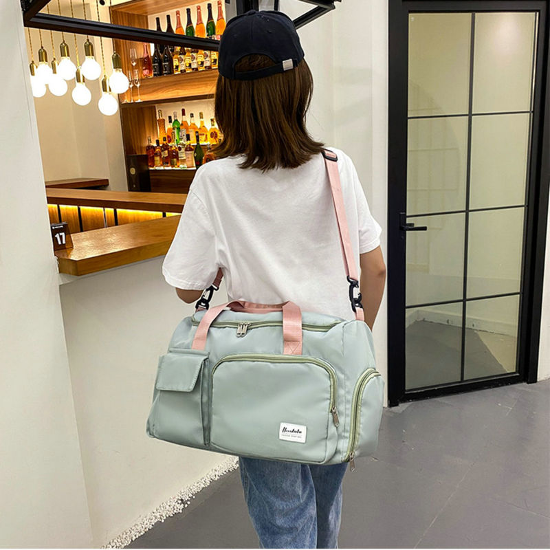 Bolsa de viaje versátil para gimnasio con múltiples bolsillos y compartimento para zapatos