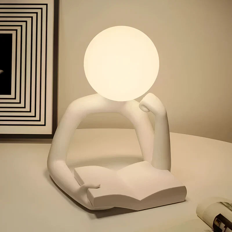 Lampada da Tavolo da Lettura Aura LumenFigure per Libri con Design Scultoreo