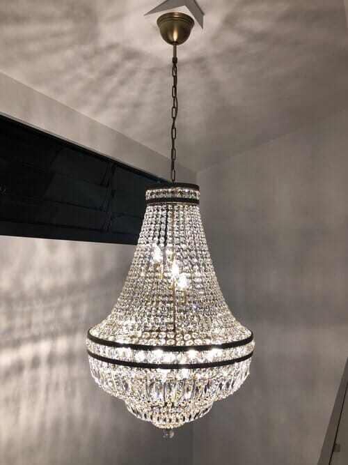 Lustre en cristal Orion avec finition laiton brossé