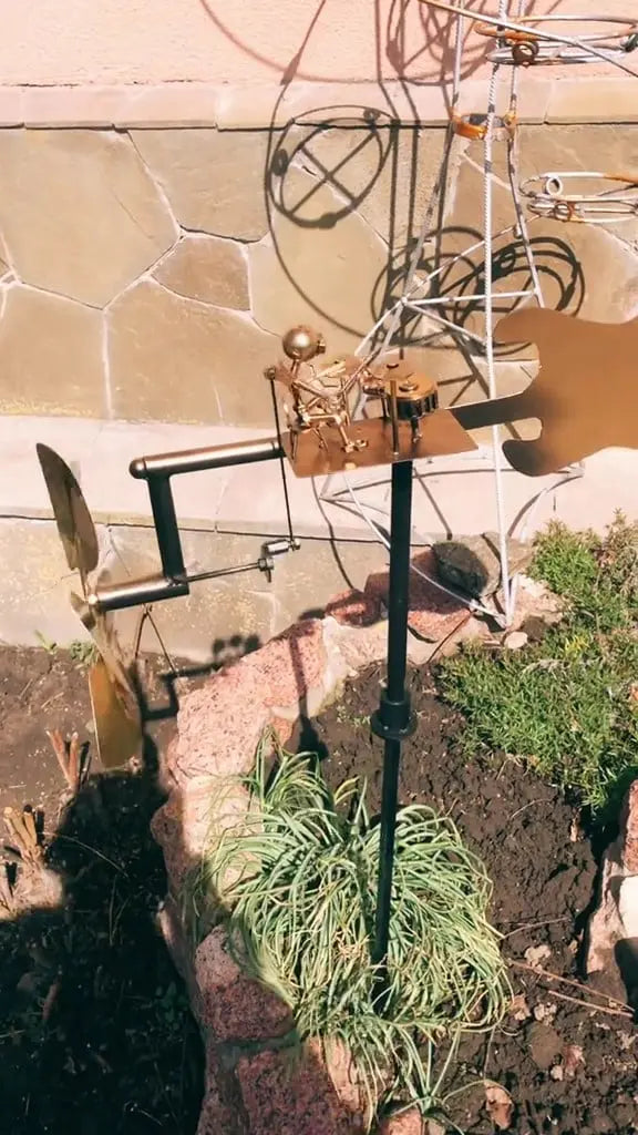 Characterful Metal Windmill Garden Decor That Moves With Rock Band Theme