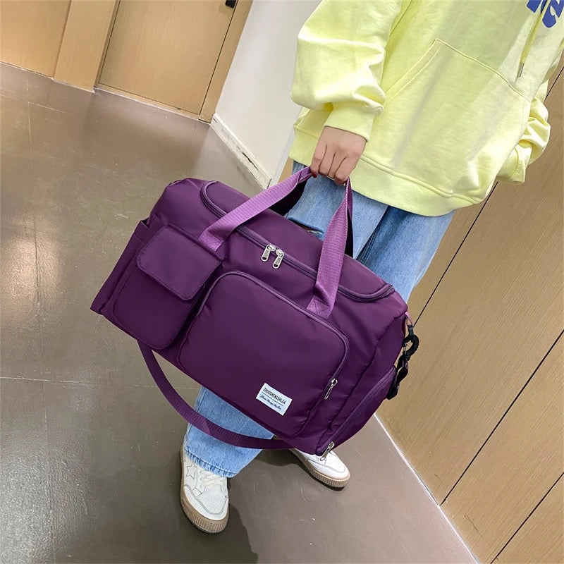 Bolsa de viaje versátil para gimnasio con múltiples bolsillos y compartimento para zapatos