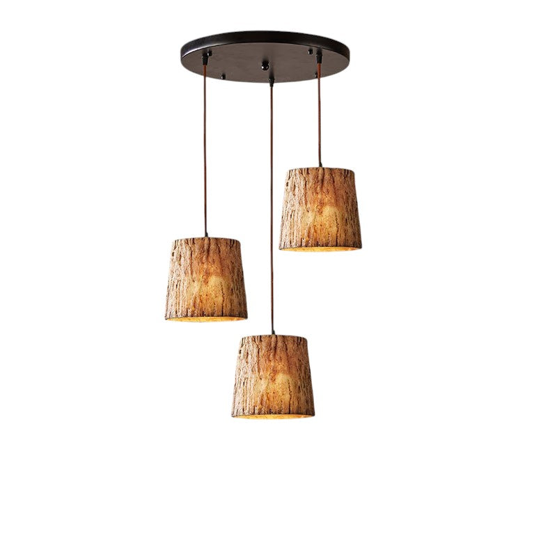 Zielona lampa wisząca w kształcie pnia drzewa do jadalni i kuchni