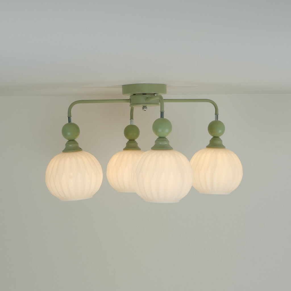 Plafonnier Lumencrest avec abat-jours en verre blanc côtelé et cadre métallique vert