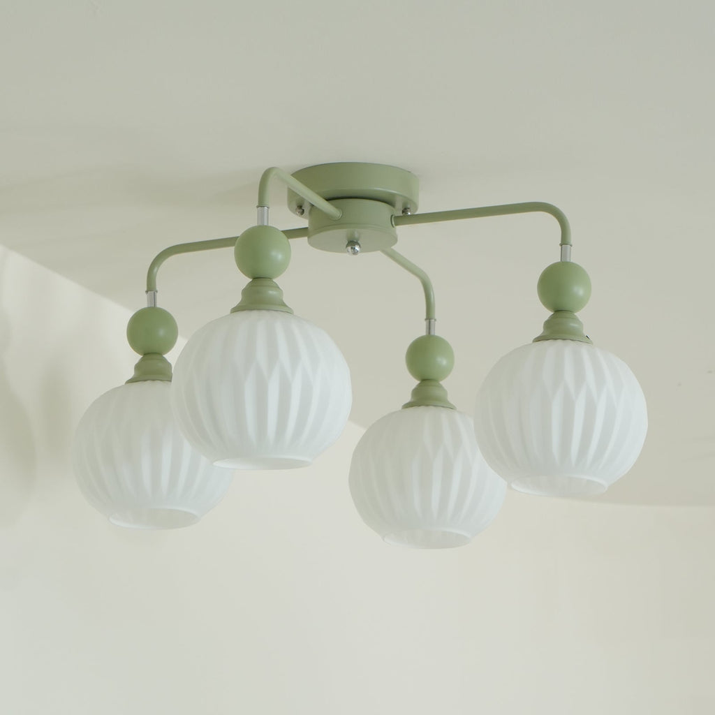 Plafonnier Lumencrest avec abat-jours en verre blanc côtelé et cadre métallique vert