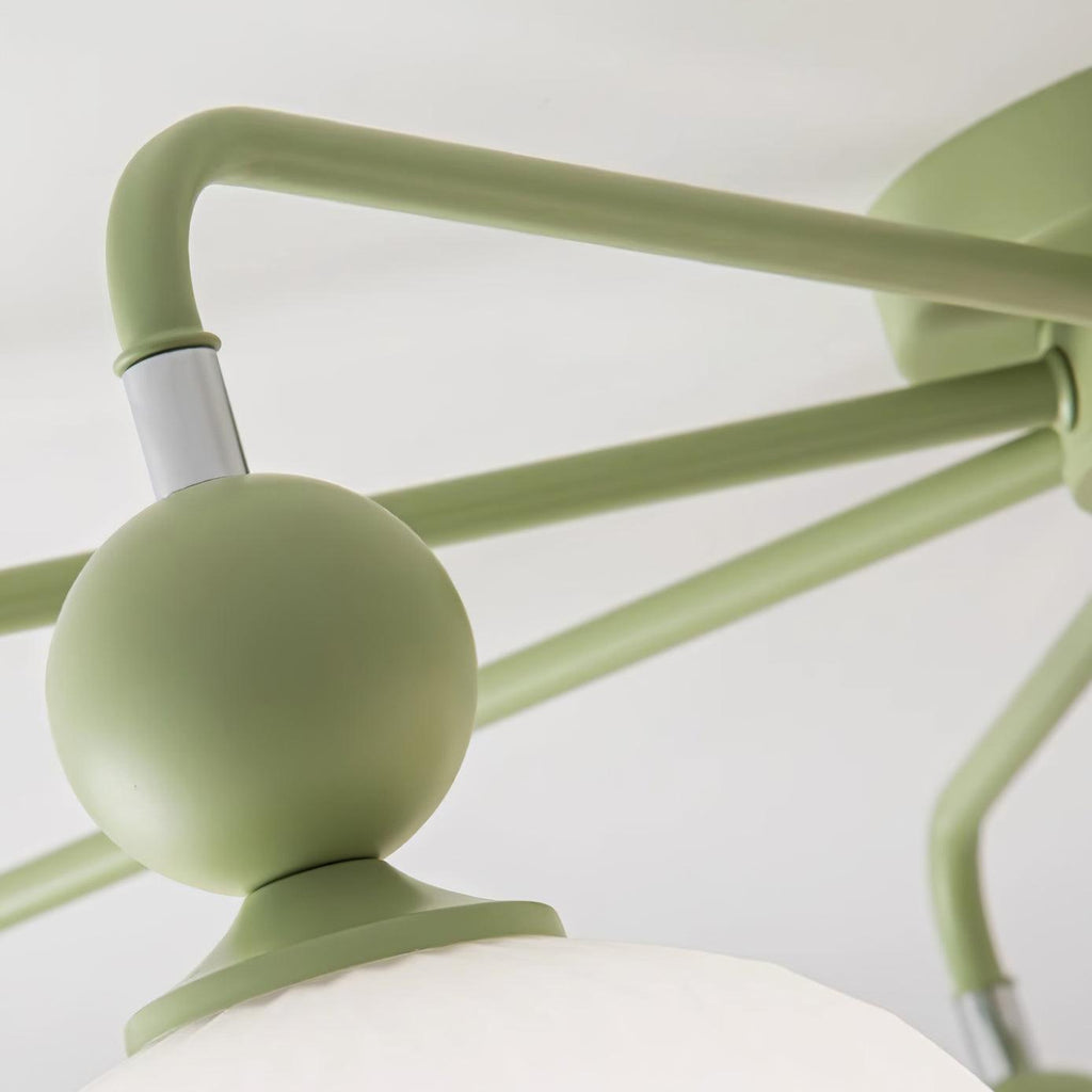 Plafonnier Lumencrest avec abat-jours en verre blanc côtelé et cadre métallique vert