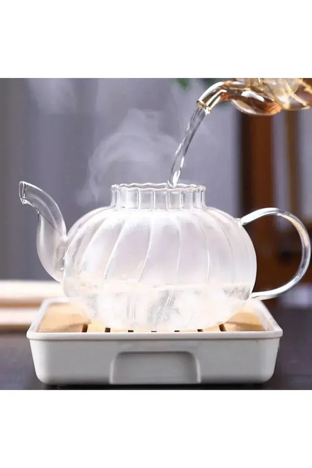 Elegantní průhledná skleněná konvice s infuzérem a víčkem pro přípravu čaje