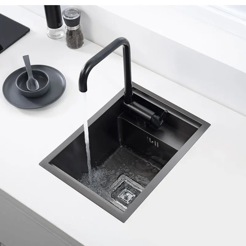 Fregadero de un solo seno de acero inoxidable oculto NookLine para cocinas y bares compactos