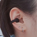Draadloze open-ear oordopjes met botgeleidingstechnologie