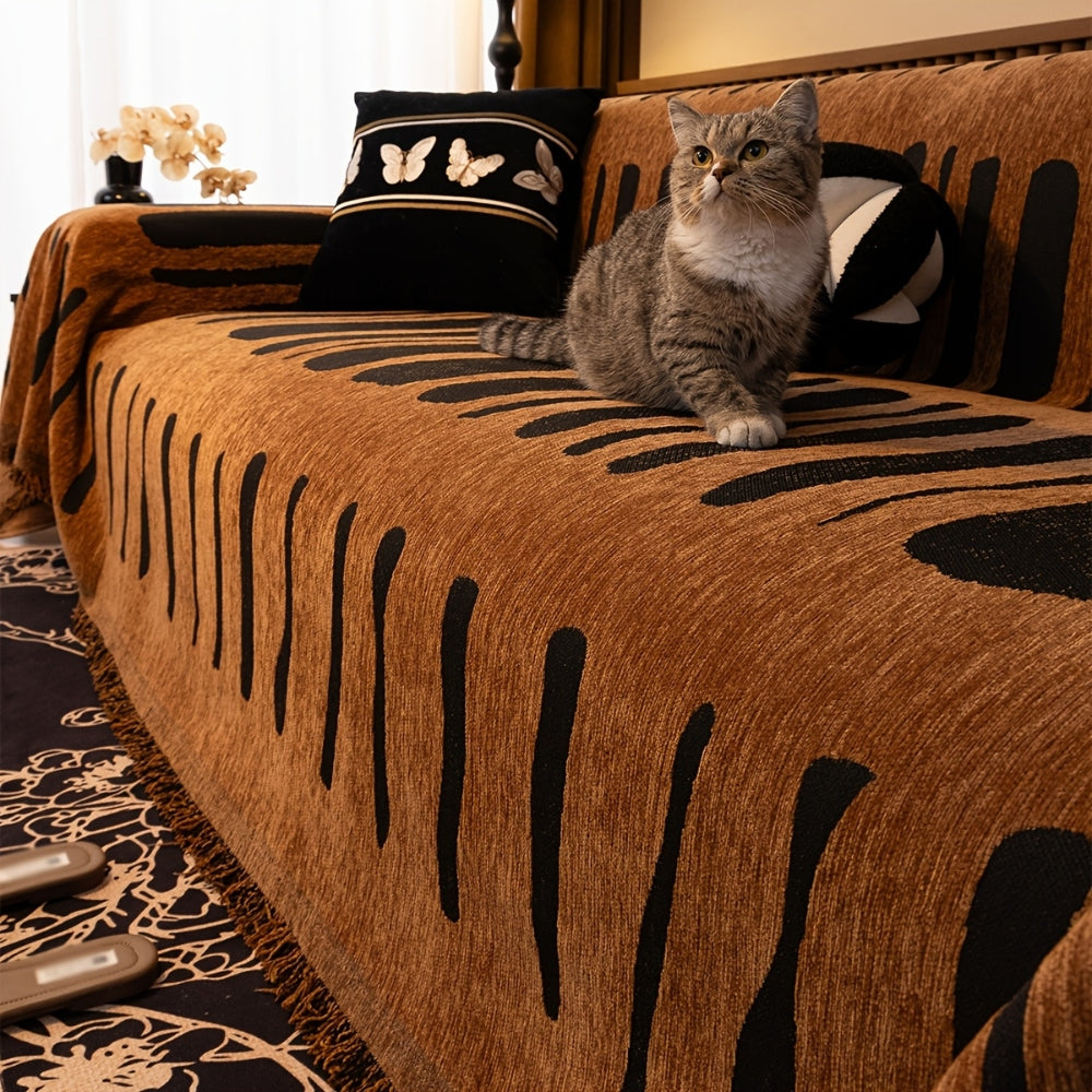 Housse de canapé Tribella en chenille avec motif géométrique tribal