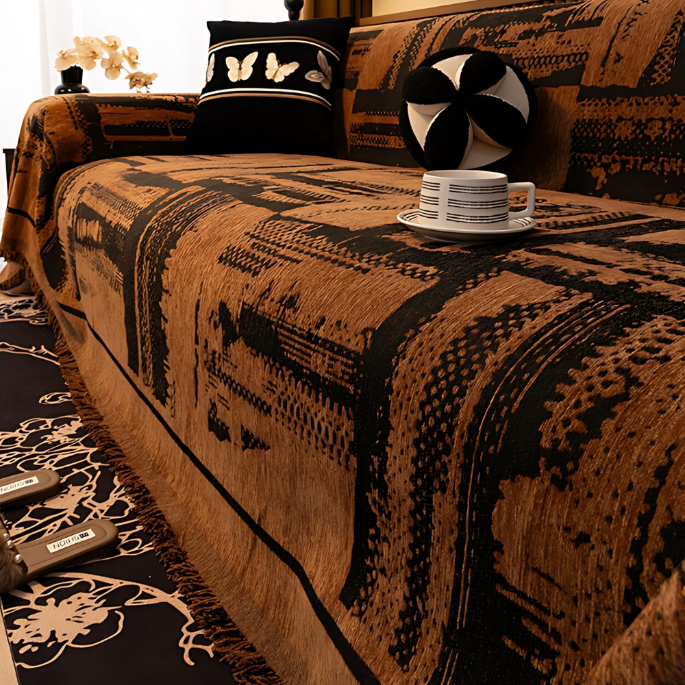 Housse de canapé Tribella en chenille avec motif géométrique tribal