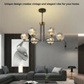 Aurorae glazen en metalen kroonluchter met warm wit licht