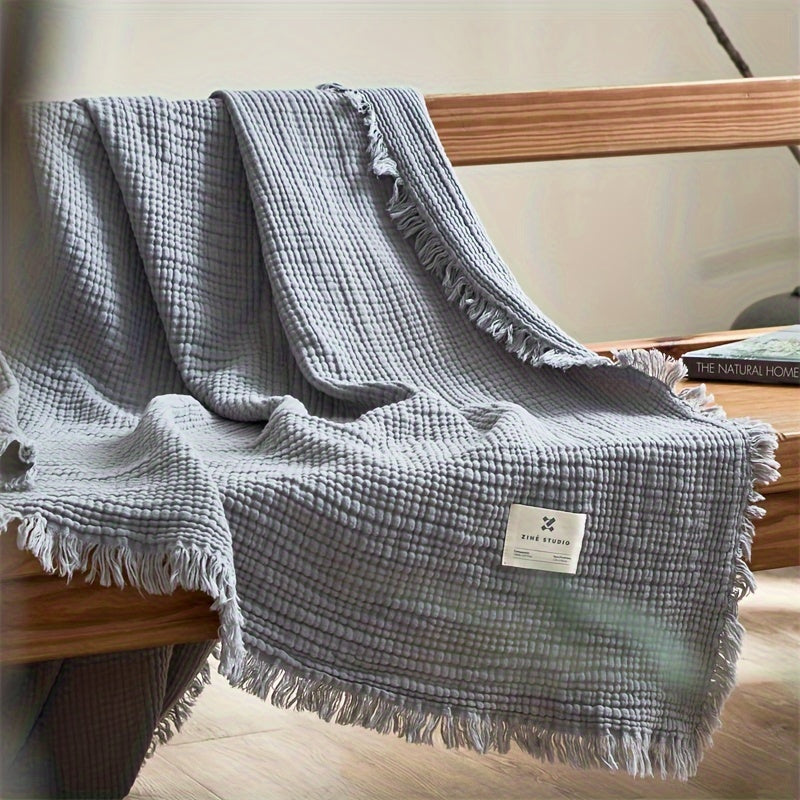 Přikrývka Olivebreeze z 4 vrstev bavlněné gázy s elegantními třásněmi pro každodenní pohodlí