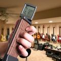 Portable Digital Guitar Training Tool For On-The-Go Practice And Learning