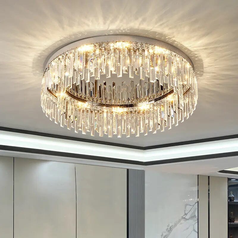 Collection de lustres Lumen Arc en finition argentée ou dorée