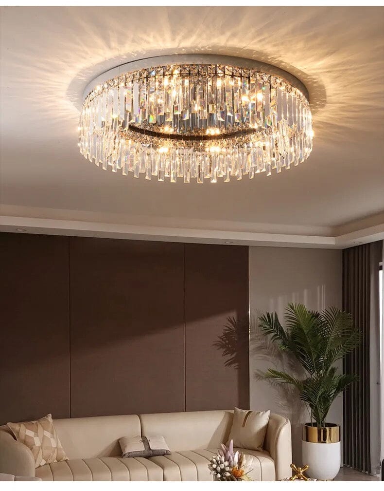 Collection de lustres Lumen Arc en finition argentée ou dorée