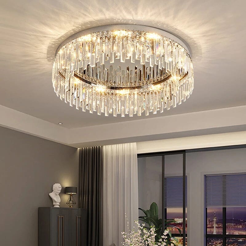 Collection de lustres Lumen Arc en finition argentée ou dorée
