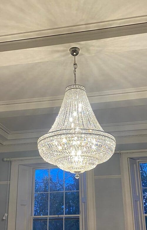 Lustre en cristal Orion avec finition laiton brossé