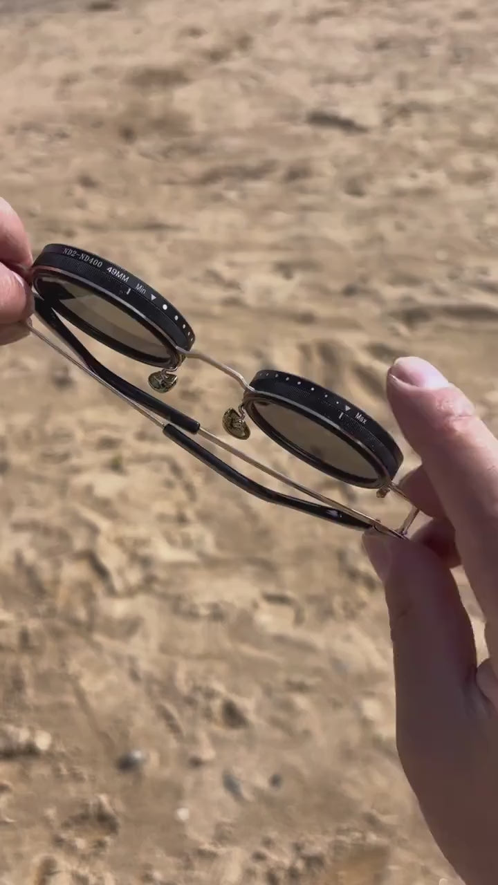 Gafas de sol negras AstraView con filtro de nueve niveles y ajuste ajustable